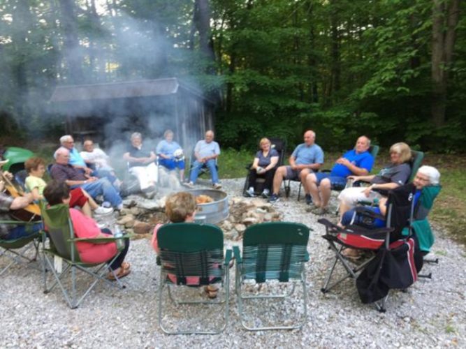 700x525-052018-gathered-around fire