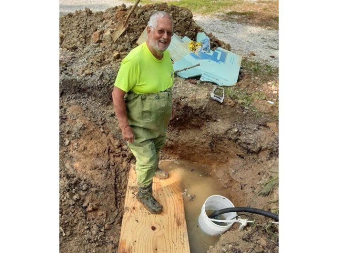 700x525-092020-man-standing-in-wet-hole